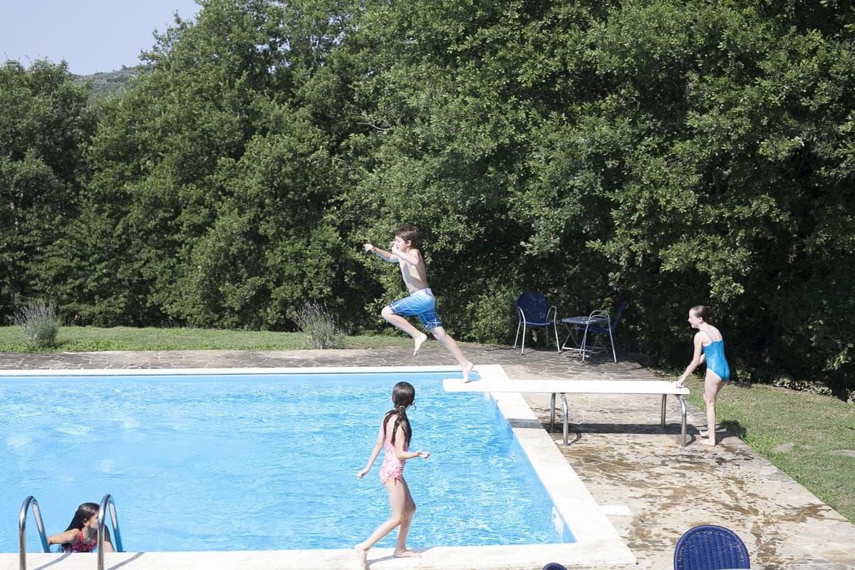 The pool in Valdambra is large and always very popular with children Children in the pool in Tuscany