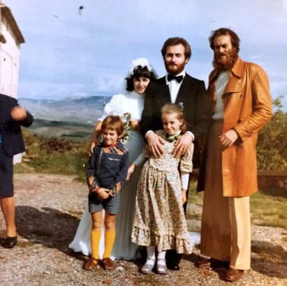 A wedding in Tuscany in 1976. I'm the one in the knee socks on the left. Wedding near Volterra in 1976