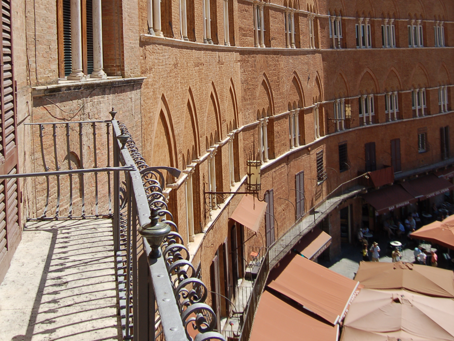 You can get tickets to be on balconies like these or at windows around the square SienaCurve